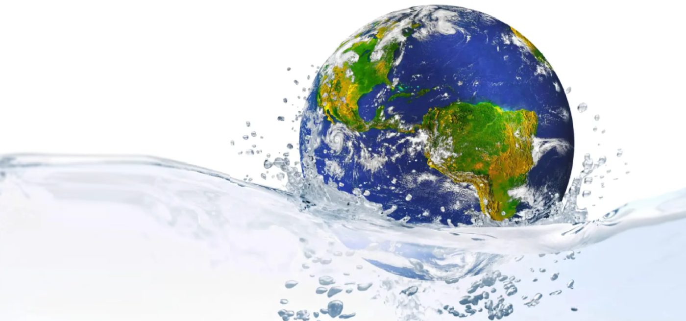 A globe is shown in the water with bubbles.